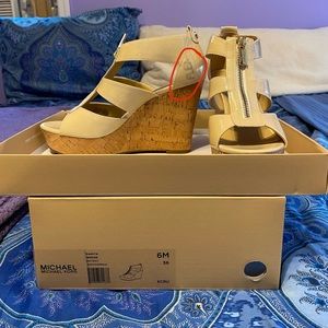 Michale Kors cream wedged sandals. Size 6.